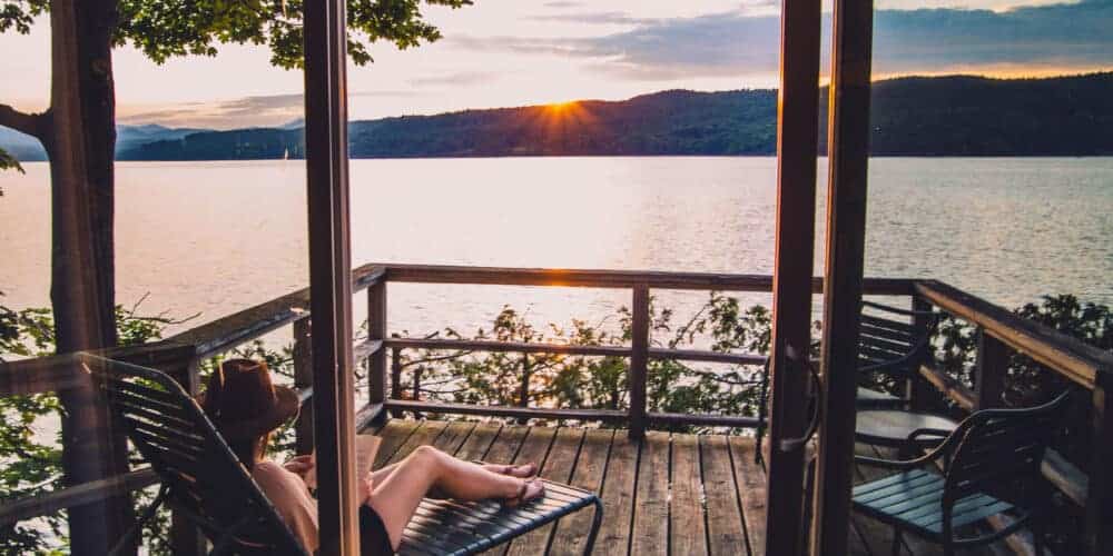 Basin Harbor Resort Porch Sunset Reading and Sipping Drink