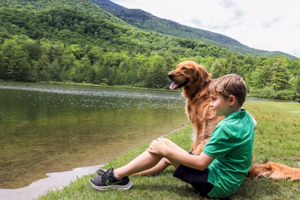 Equinox Resort Pet Friendly Dog and Child by Pond